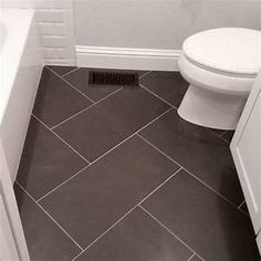 20 Small Bathroom Floor Tile Ideas, Floor Tile Patterns For Small Bathrooms
